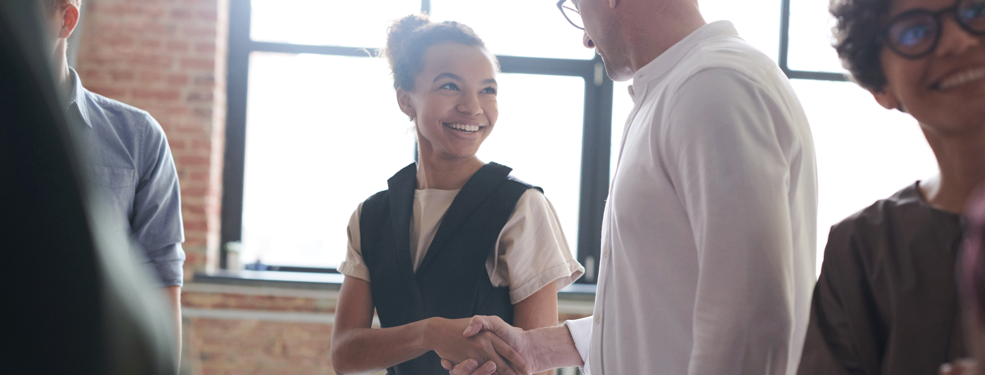 Student shaking potential employers hand