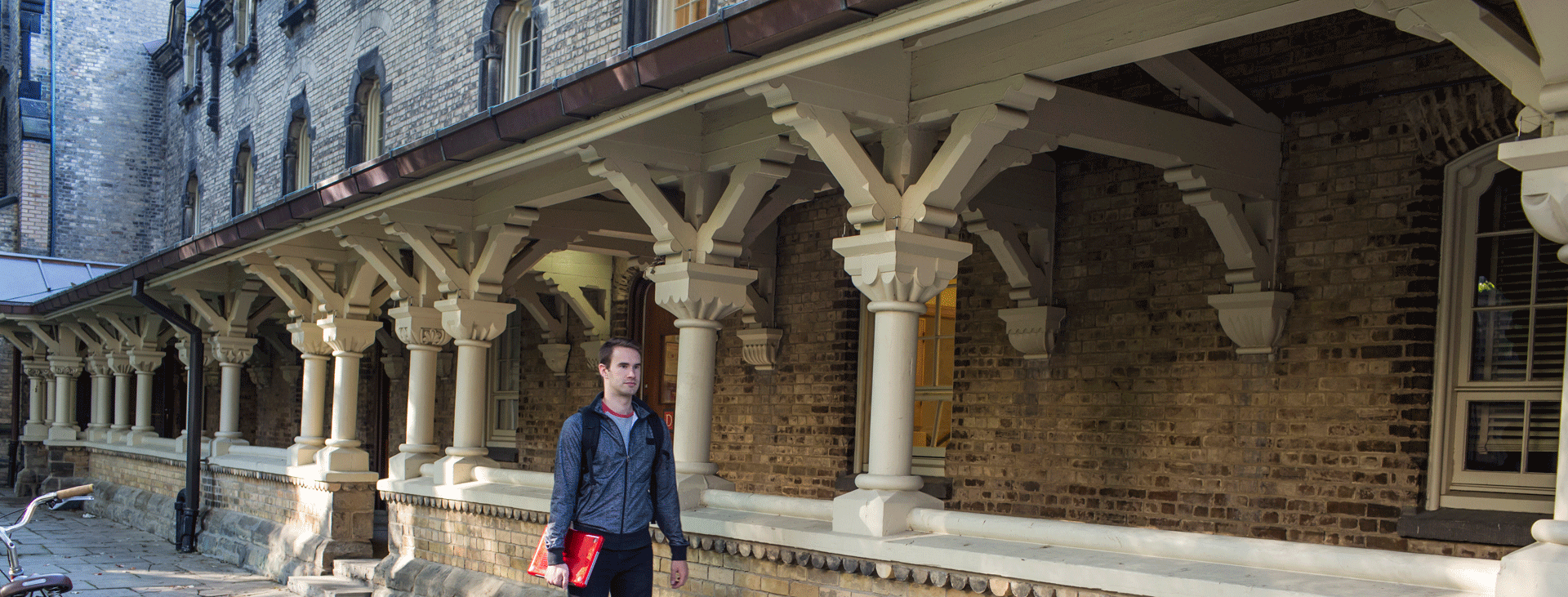 Older U of T residence with beautiful architectural archway