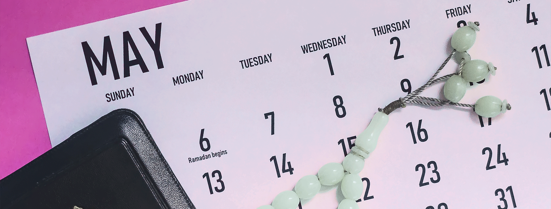 May calendar page with light green religious beads