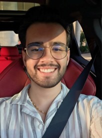 Headshot of Shayan smiling.